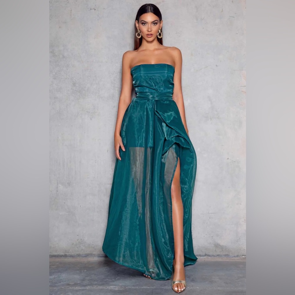Organza gown with a structured peplum design